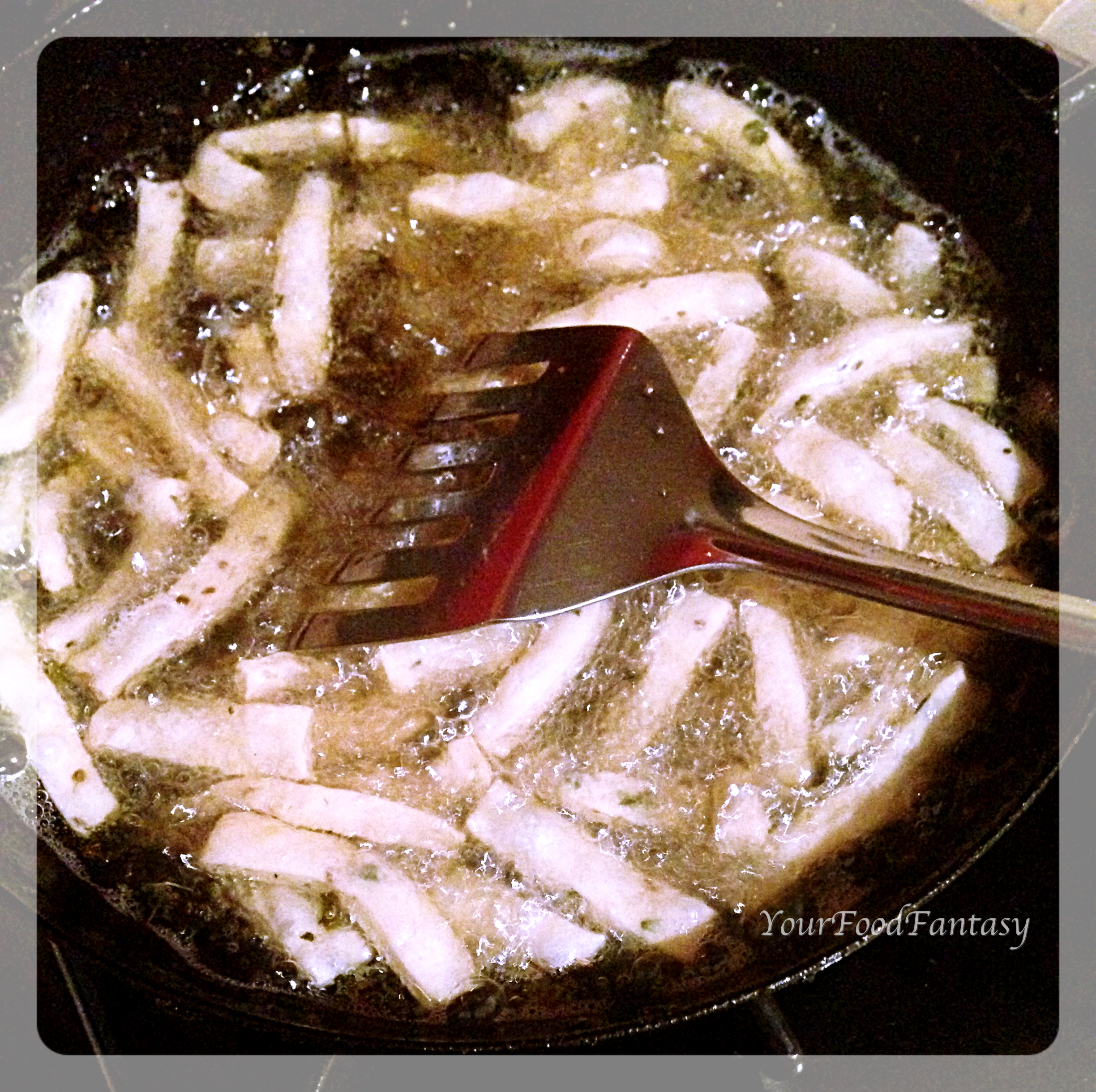 Namak Paray being fried | Namak Paray recipe at yourfoodfantasy.com by meenu gupta