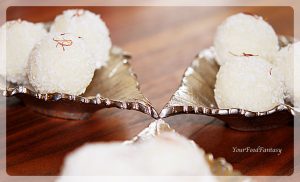 another picture of coconut ladoo with desiccated coconut at yourfoodfantasy.com