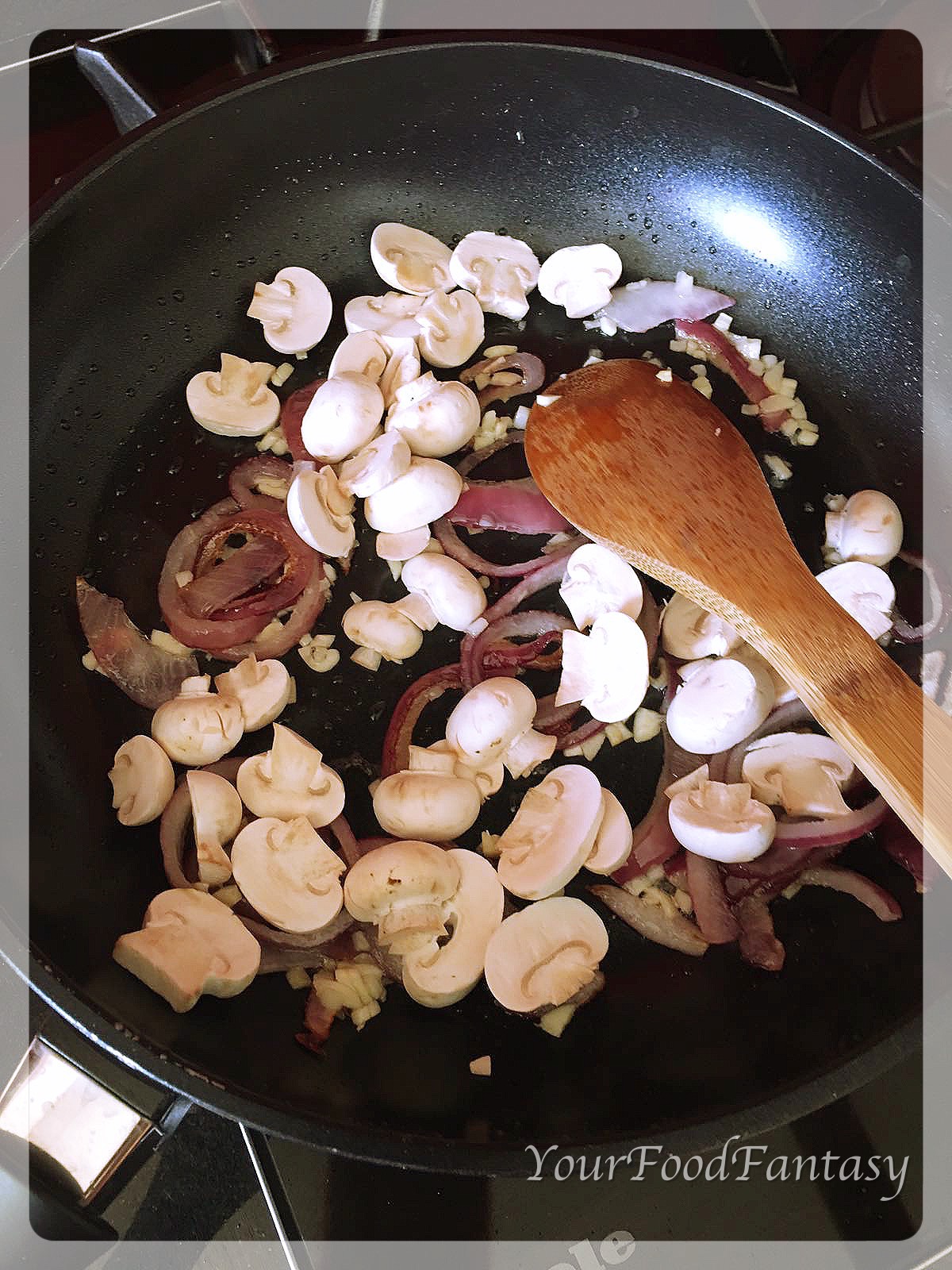 frying mushroom, garlic and onion for bruschetta con funghi at yourfoodfantasy.com by meenu gupta