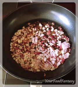 frying onion for filling of potato puff patties | yourfoodfantasy.com by meenu gupta