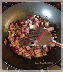 Frying onion for baingan bharta | Your Food Fantasy