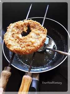 Draining Sugar Syrup from Ghevar | Ghevar Recipe | YourFoodFantasy.com