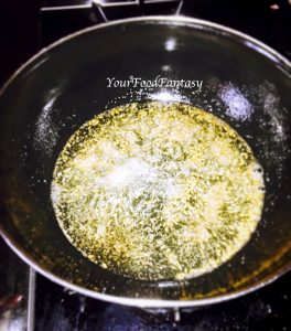 Frying cumin seeds and Onion - Matar Paneer Recipe | Your Food Fantasy
